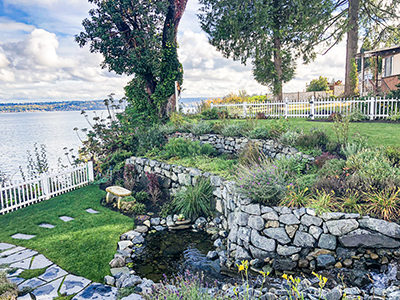 Fox Island, WA, - Residential Project, Water Features, Terracing & Planting, Rock Walls, and Stone Pathway Landscape Construction & Installation, Custom Pond, Stream, Water Feature Project. Stone Path, Rock Walls, Terracing & Planting, Custom Stonework