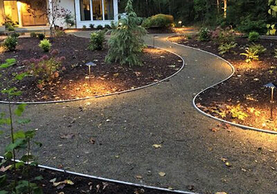 Are you seeking landscaping experts specializing in the installation of captivating outdoor lighting solutions to illuminate your space in Gig Harbor, Key Peninsula, or Kitsap County, WA?